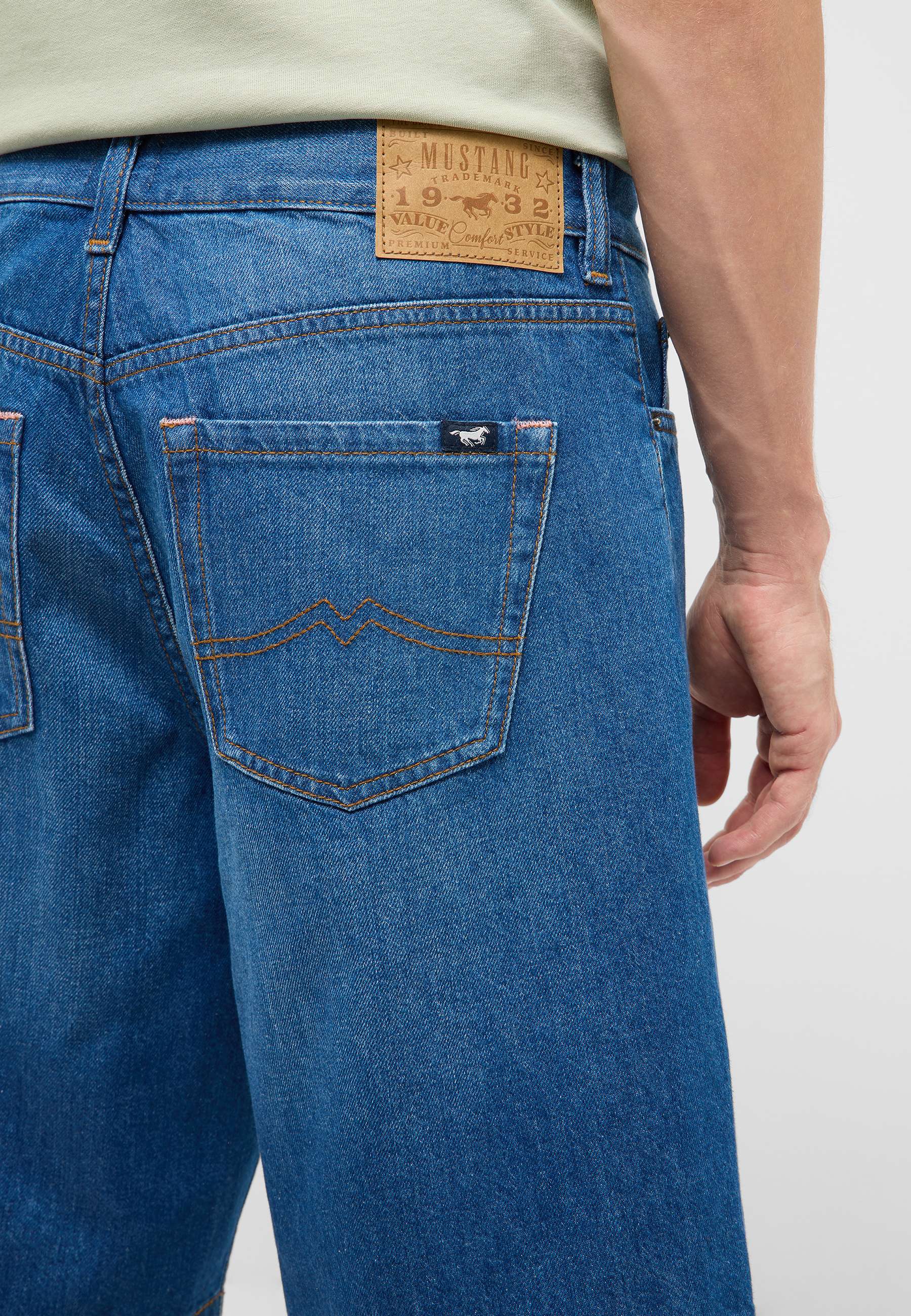 Denim jeans, Back pocket, Leather patch, Blue jeans, Stitching detail
